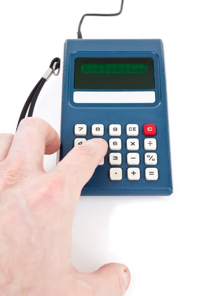 Mão empurrando chave vintage calculadora isolado fundo branco — Fotografia de Stock
