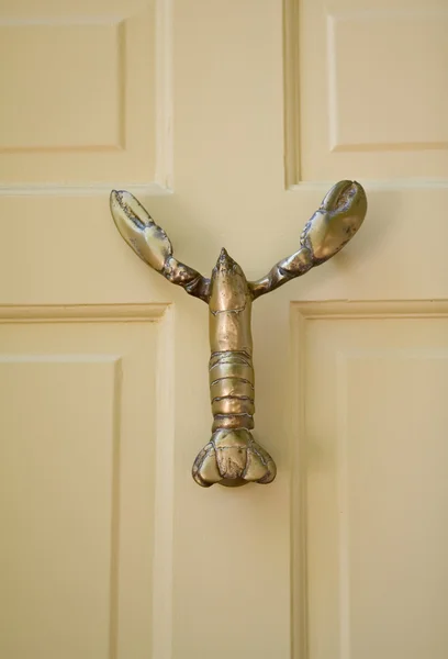 Lobster Shaped Door-Knocker On Yellow Wooden Door — Stock Photo, Image
