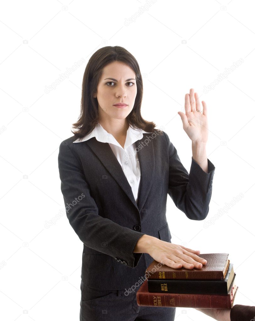 White Woman Hand Raised Swearing Stack of Bibles