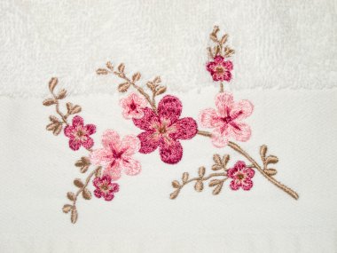 Embroidery on white towel clipart