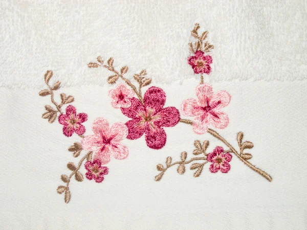 Embroidery on white towel — Stock Photo, Image