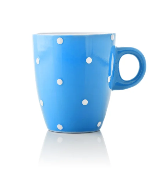Blue mug with polka dot pattern — Stock Photo, Image