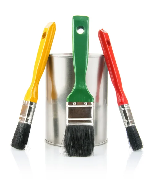 Paint tin with brushes — Stock Photo, Image