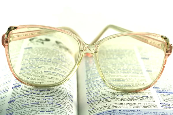 A könyv szemüveg Stock Kép