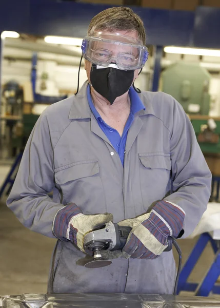 Worker with angle grinder — Stock Photo, Image