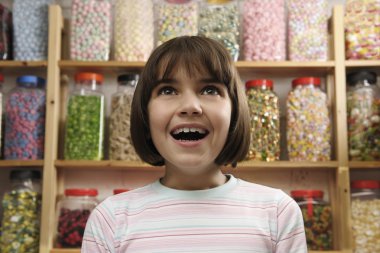 Girl in sweet shop clipart