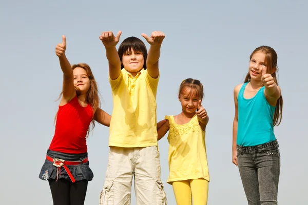 Happy children with thumbs up — Stock Photo, Image