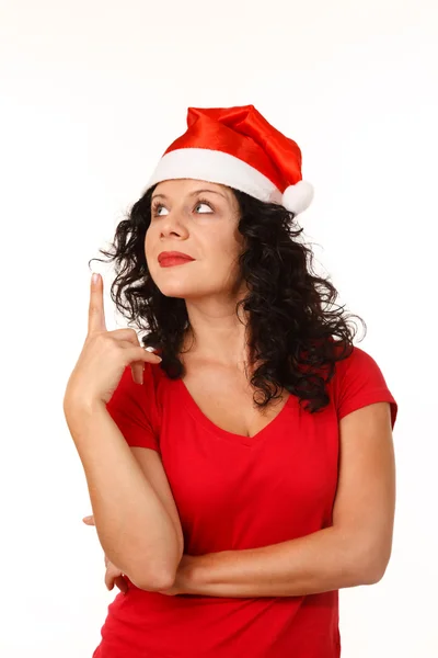Рождественская девушка в шляпе Санты — стоковое фото