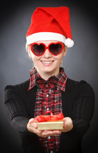 Santa woman with heart shaped glasses — Stock Photo, Image
