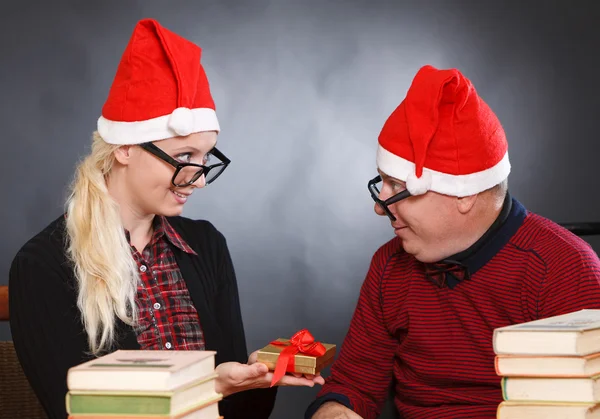Two nerds in Santa hats — Stock Photo, Image