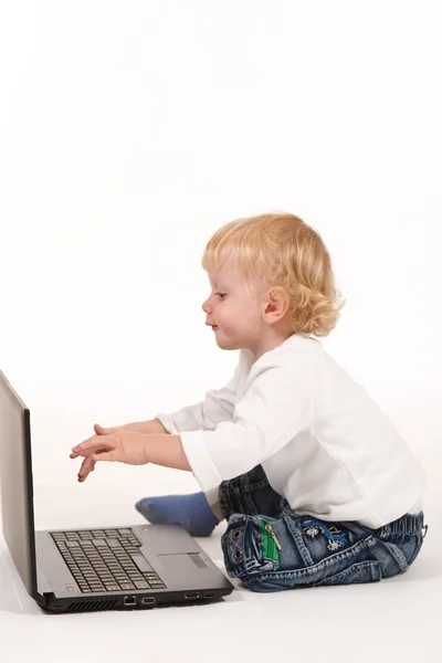 Boy with Laptop Stock Picture