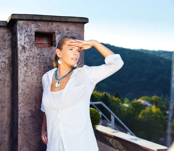 stock image Girl outdoor, white dressed, looking