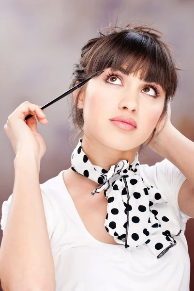 Mulher e maquiagem cosmética — Fotografia de Stock