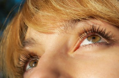 Blond girl's eye closeup