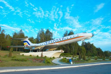 Tupolev TU-134 airplain standing as monument near to Chisinau airport, Moldova. This picture has taken in the morning sun rays. clipart