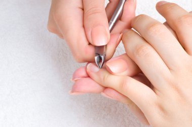 Nail salon - cuticle cut clipart