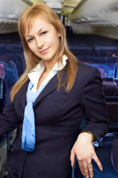 Blond lucht gastvrouw (stewardess) — Stockfoto