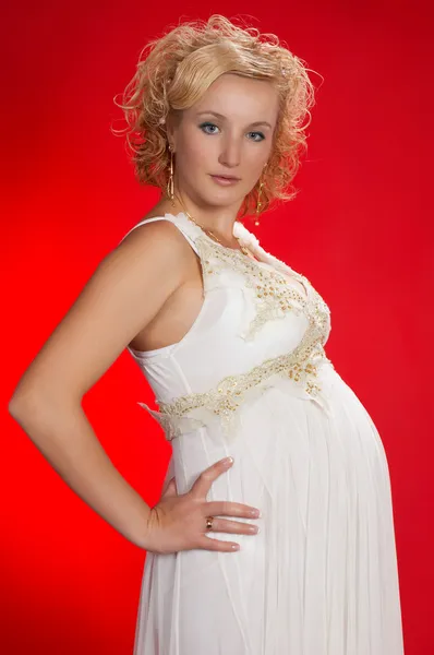 Pregnancy on red — Stock Photo, Image