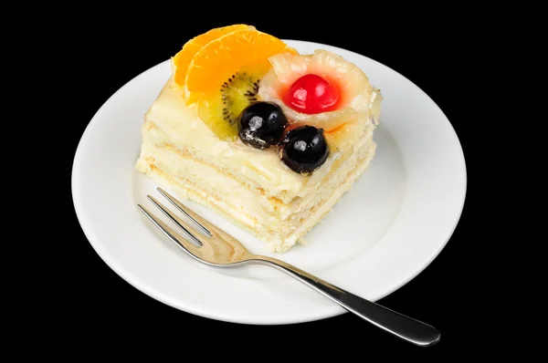 Smetanové dortík s friuts na vrcholu — Stock fotografie