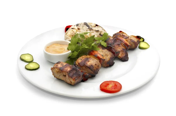 Shish kebab with rice and mushrooms — Stock Photo, Image