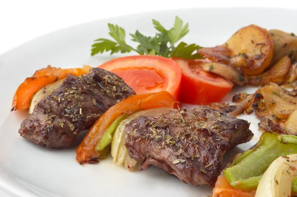 Grilled kebab with vegetables — Stock Photo, Image