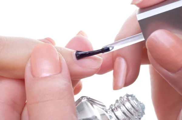 Aplicação de manicure, esmalte transparente — Fotografia de Stock