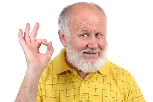Starszy człowiek łysy gesty — Zdjęcie stockowe
