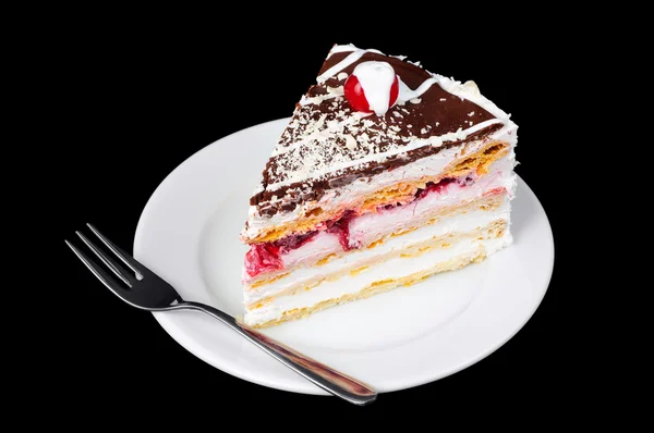 Gâteau fantaisie avec cerise sur le dessus — Photo