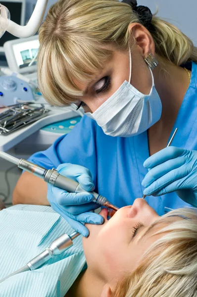 Dentistry, drilling the tooth — Stock Photo, Image