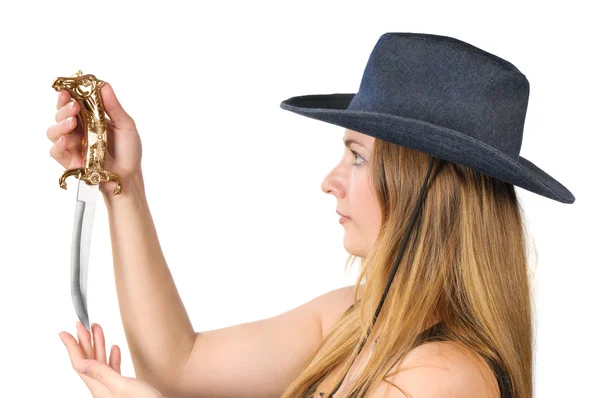 Blond girl with knife and hat — Stock Photo, Image
