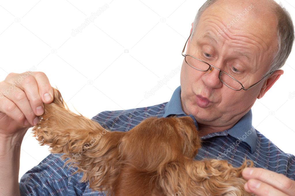 Bald senior man with dog