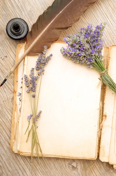 Old book with lavender flowers — Stock Photo, Image