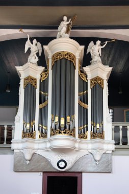 Organ in old church in Holland clipart