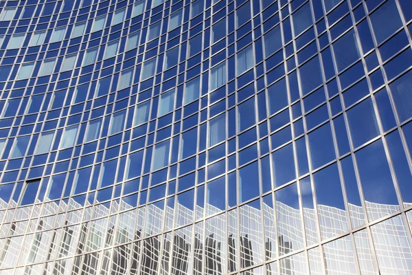 Reflection of sky and building — Stock Photo, Image