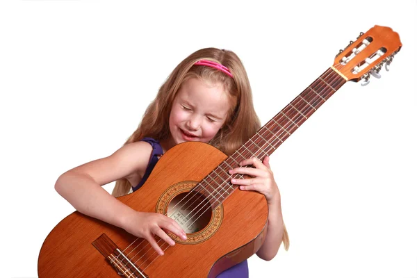 Маленька дівчинка з іспанською гітарою — стокове фото