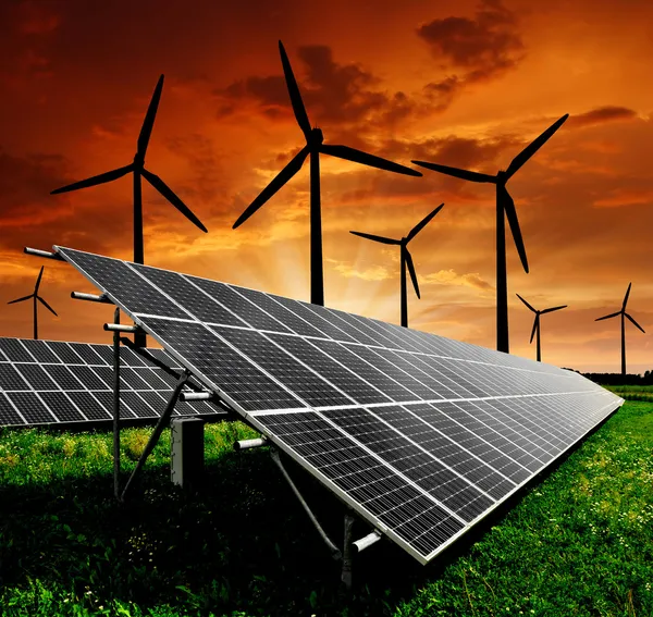 stock image Solar energy panels and wind turbine