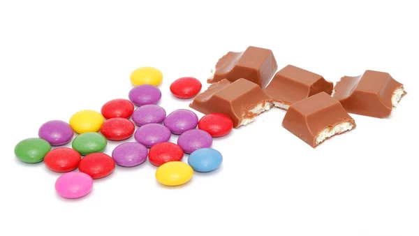 Milchschokolade und Kekse — Stockfoto