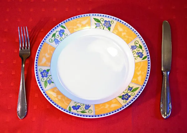 Plato con tenedor y plato . — Foto de Stock