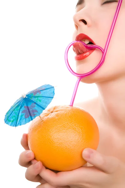 Woman's lips with fruit and straw — Stock Photo, Image