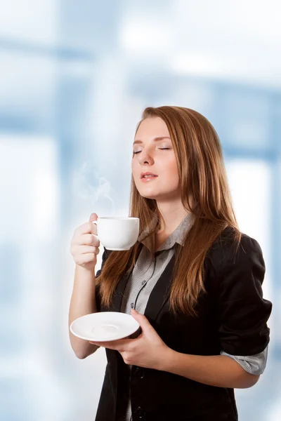 コーヒーを飲む女性実業家 ロイヤリティフリーのストック写真