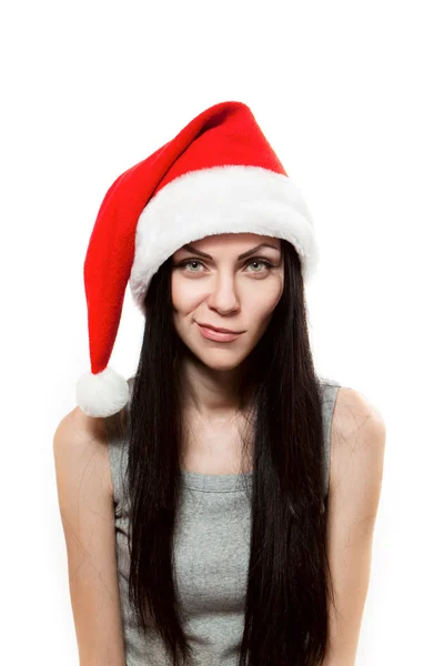 Молода дівчина в Санта-Клаус капелюх — стокове фото