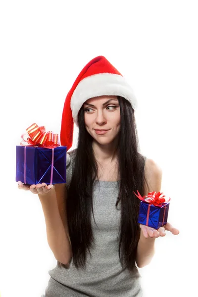 Girl chooses gift — Stock Photo, Image