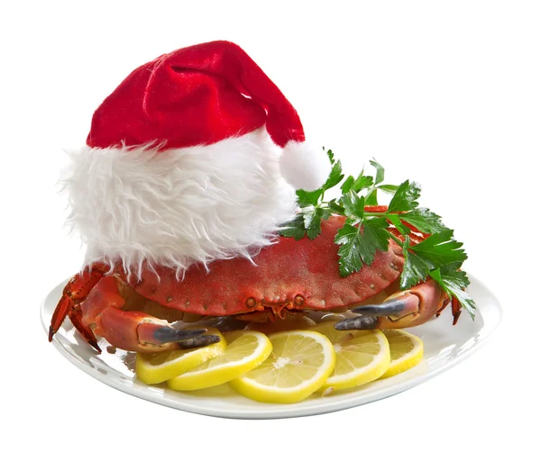 Caranguejo em chapéu de Papai Noel em uma bandeja — Fotografia de Stock