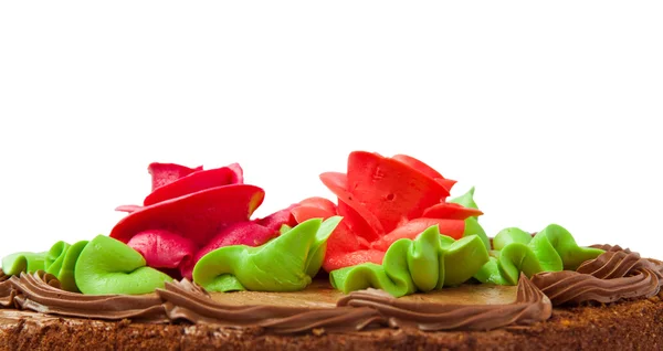 Ciasto czekoladowe z dwóch róż w kolorze kremowym. na białym tle. — Zdjęcie stockowe