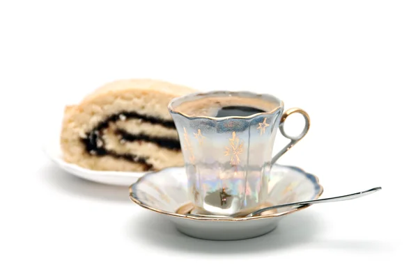Чашку кофе с рулоном . — стоковое фото