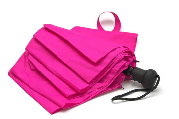 Roze paraplu geïsoleerd op witte achtergrond. — Stockfoto