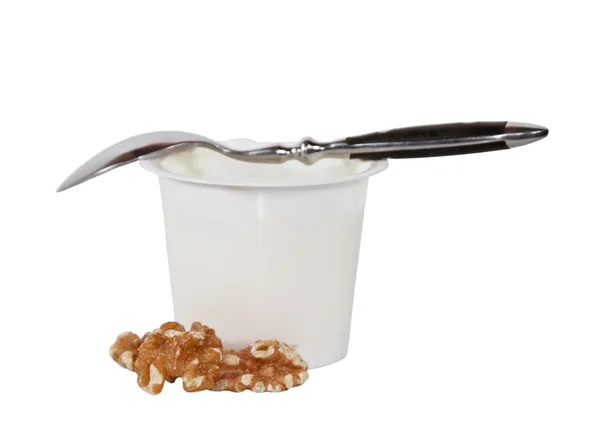 Yogurt in un barattolo con un cucchiaio . — Foto Stock