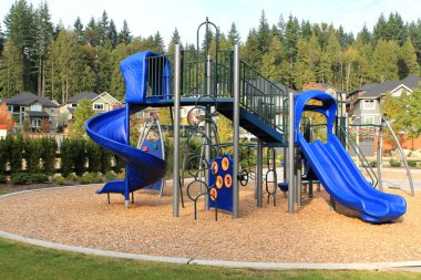 Playground in a calm residential area clipart