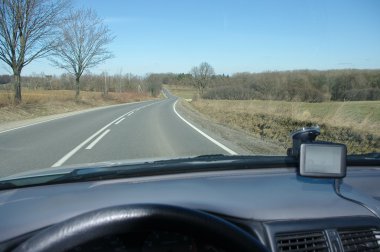 Asphalt road from car cabine clipart