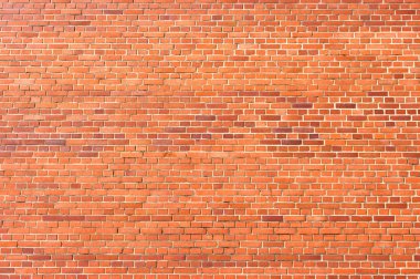 Wall texture for background with small red bricks clipart